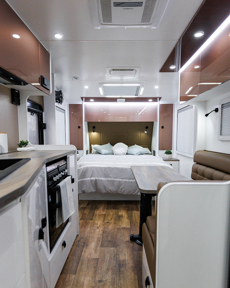 ProRV Falcon Angle Kitchen Caravan Interior Living Area Full View Facing Bed.