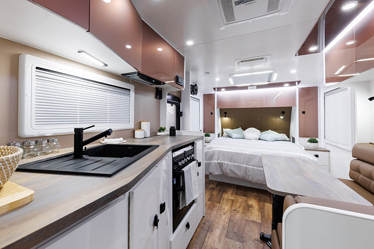 ProRV Falcon Angle Kitchen Caravan Interior Living Area Full View Facing Bed Angled.