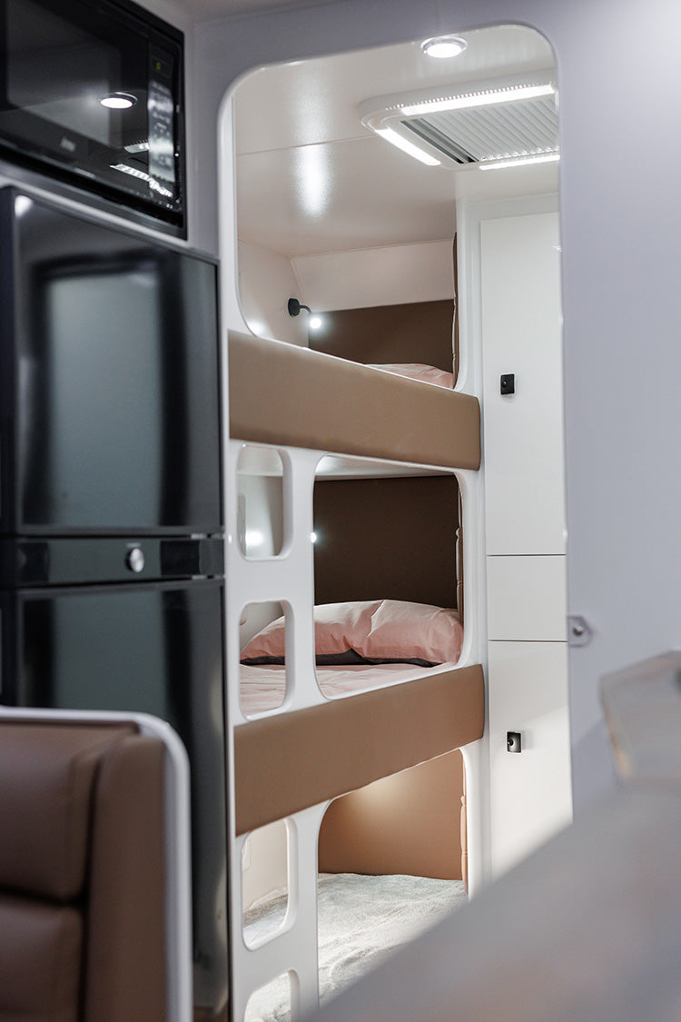 ProRV Falcon Angle Kitchen Caravan Interior Bunks Angled to Include Fridge and Microwave.