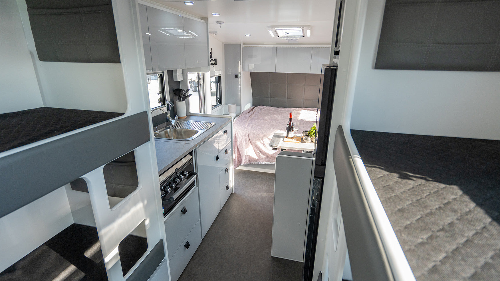 ProRV Family Hawk Caravan Interior Living Area Full View Zoomed Out to Include Bunks.