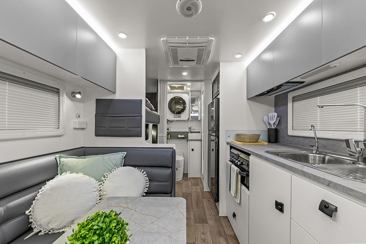 ProRV Family Jaguar Caravan Interior Living Area Full View Facing Toilet.
