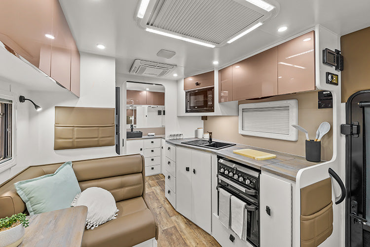 ProRV Kookaburra Aluminium Frame Caravan Interior Living Area Full View Facing Toilet Angled Towards Kitchen.