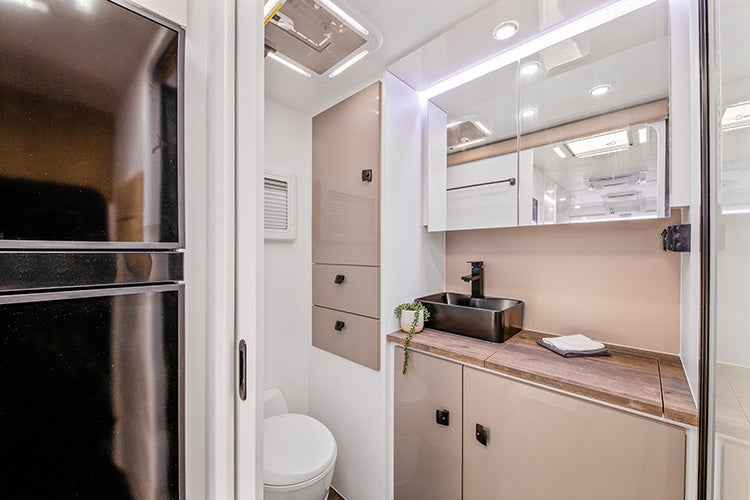 ProRV Panda Aluminium Cravan Interior Toilet Including Tap, Sink, and Cupboards.