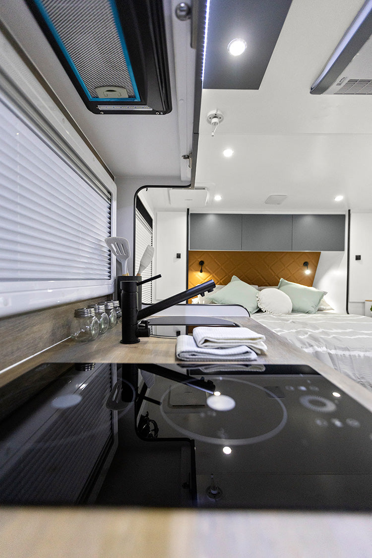 ProRV Puma Aluminium Frame Caravan Interior Kitchen Zoomed Into Cooktop and Tap.