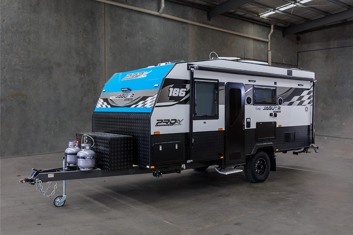 ProRV Caravans Jaguar caravan parked in well lit warehouse.