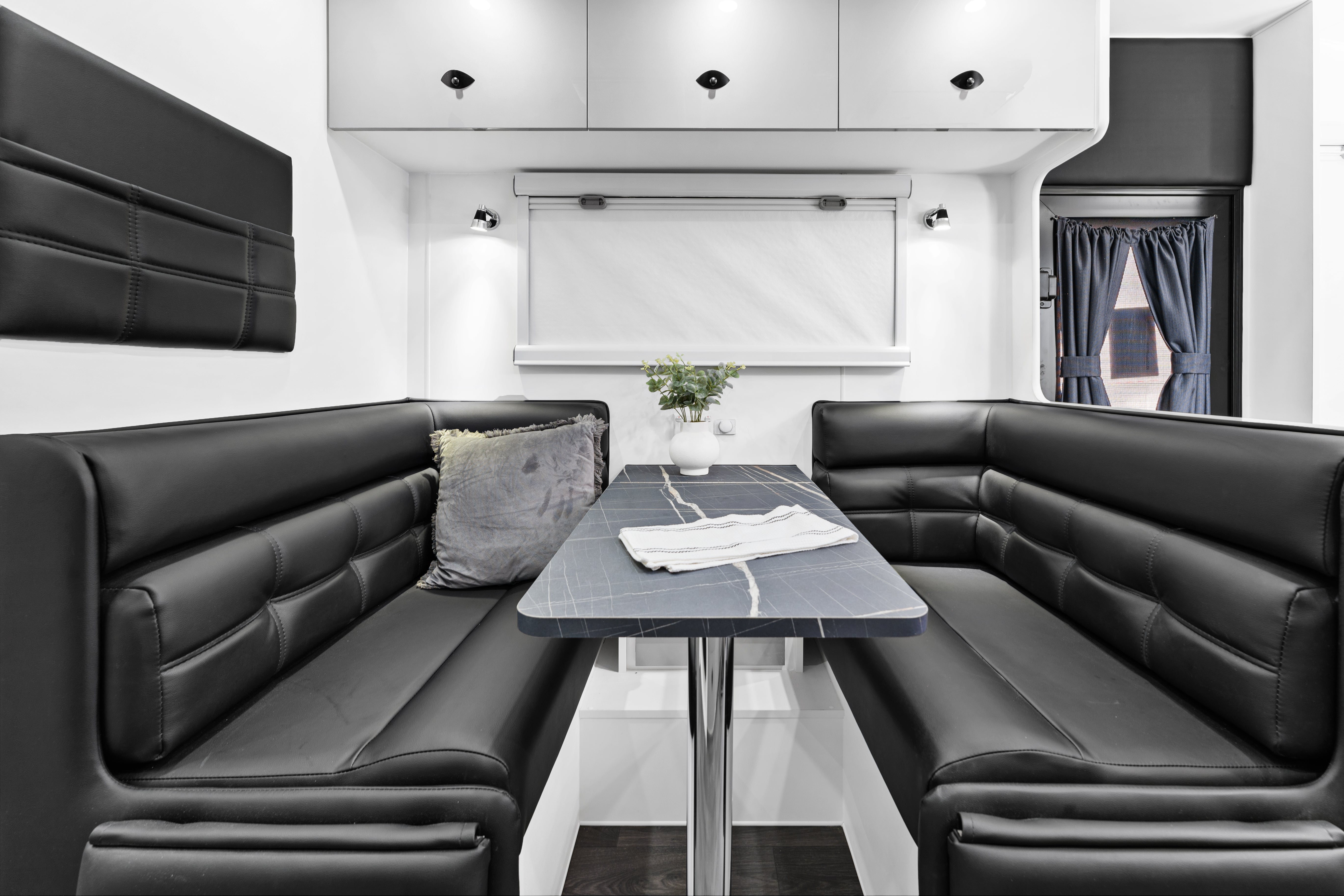 ProRV Rextor Aluminium Frame Caravan Interior Table and Chairs Side View.