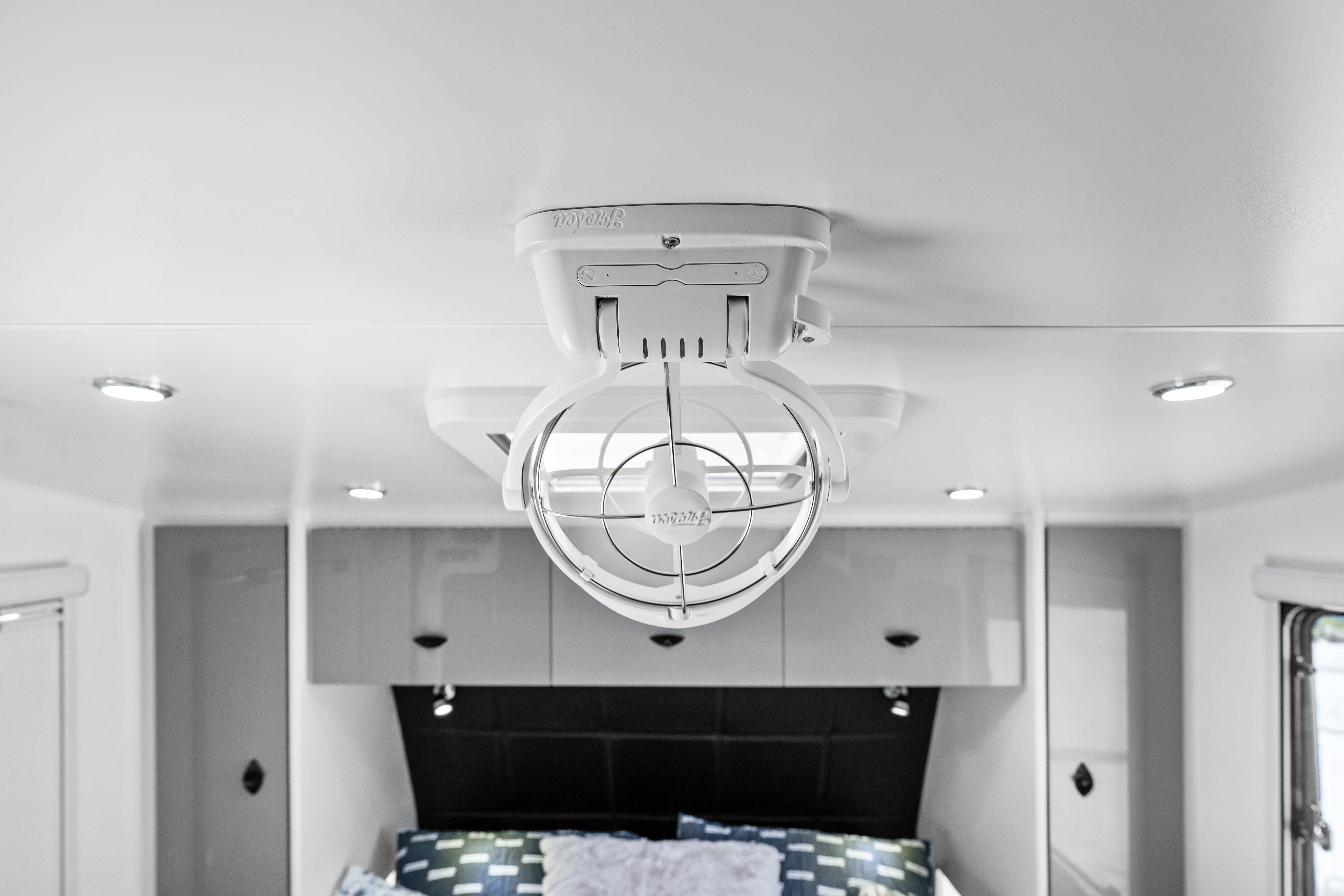 ProRV Rextor Aluminium Frame Caravan Interior Fan on Ceiling Above Bed.