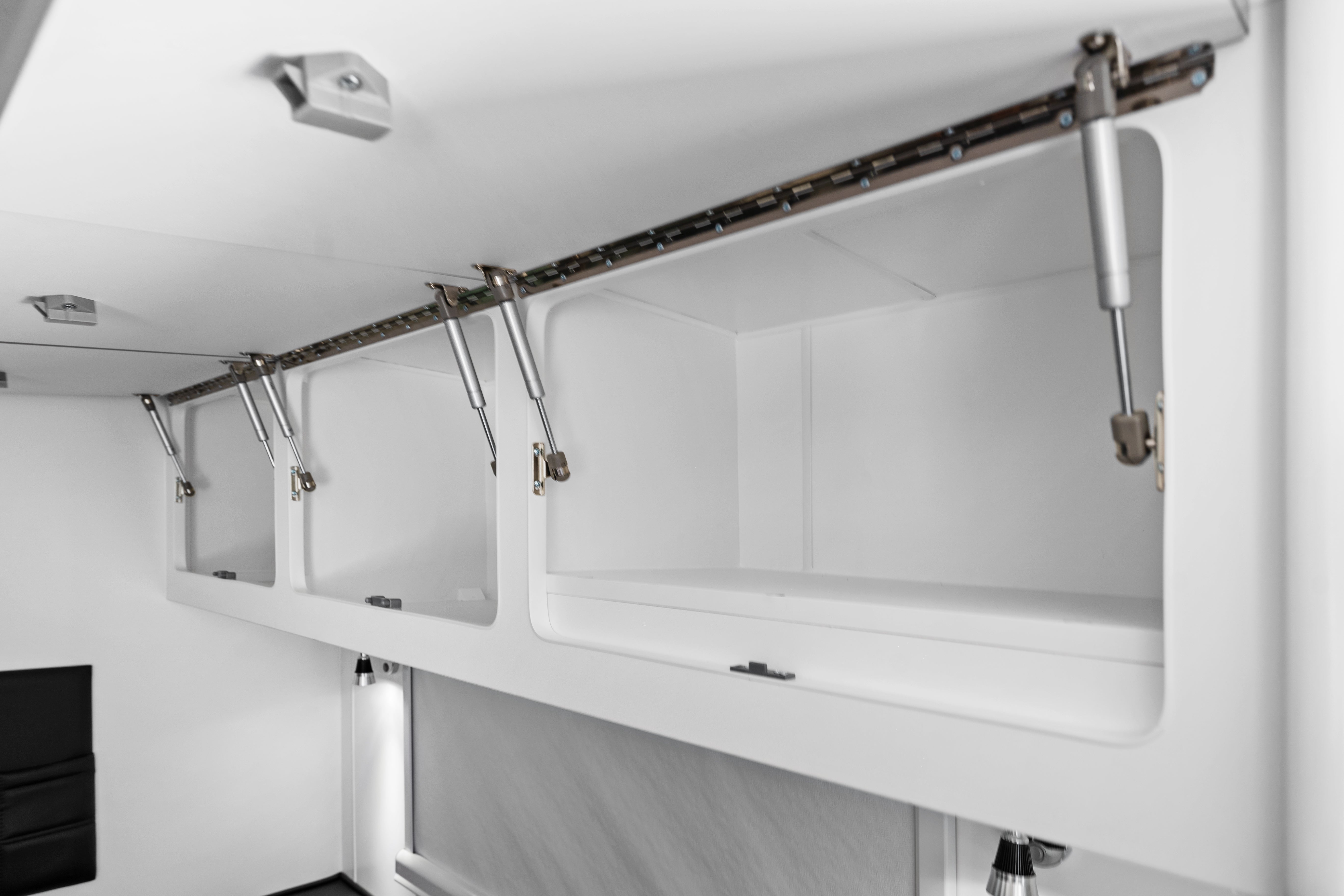 ProRV Rextor Aluminium Frame Caravan Interior Opened Cupboards.
