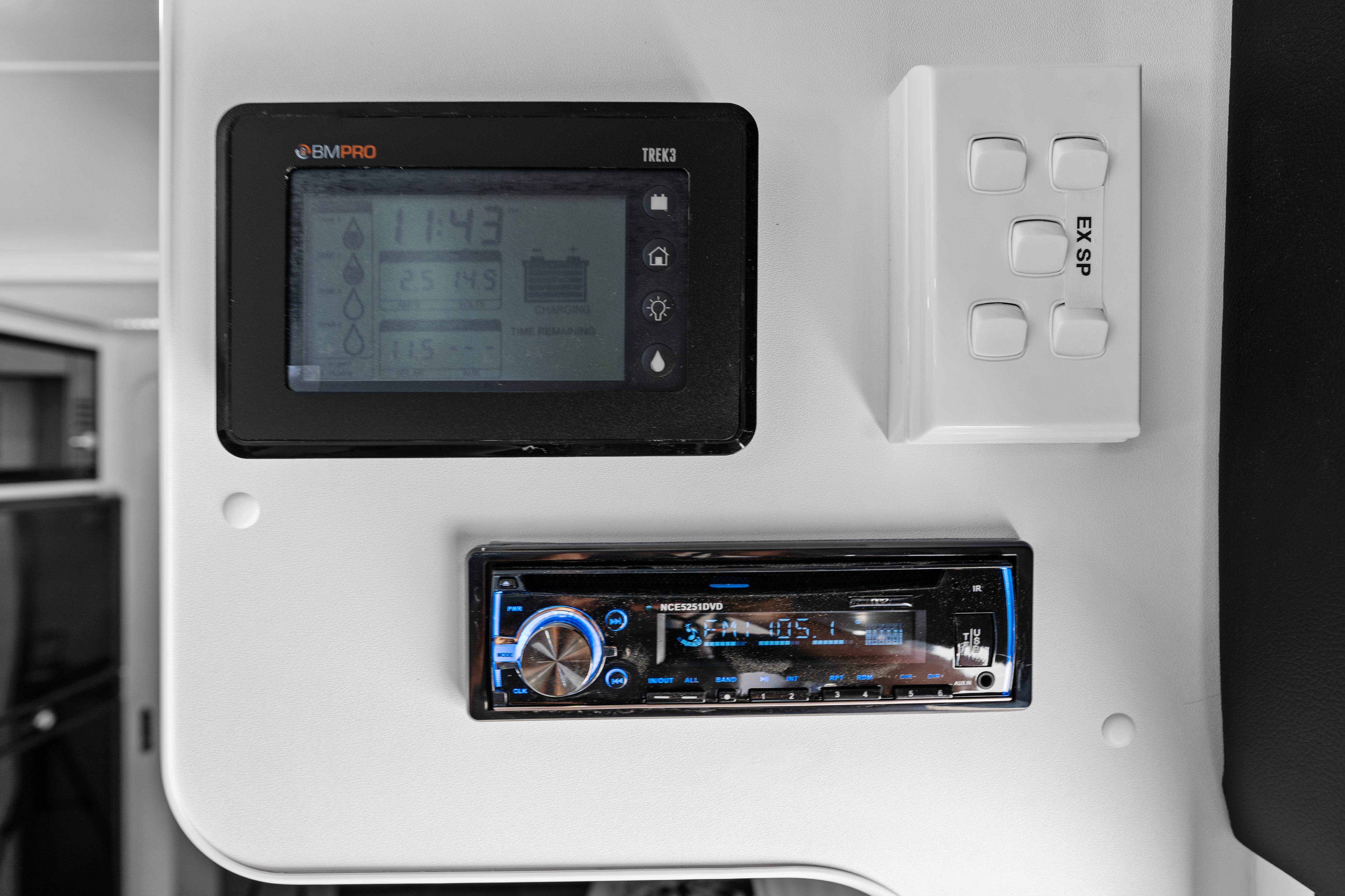 ProRV Rextor Aluminium Frame Caravan Interior BMPro Power Management System and Radio Player.