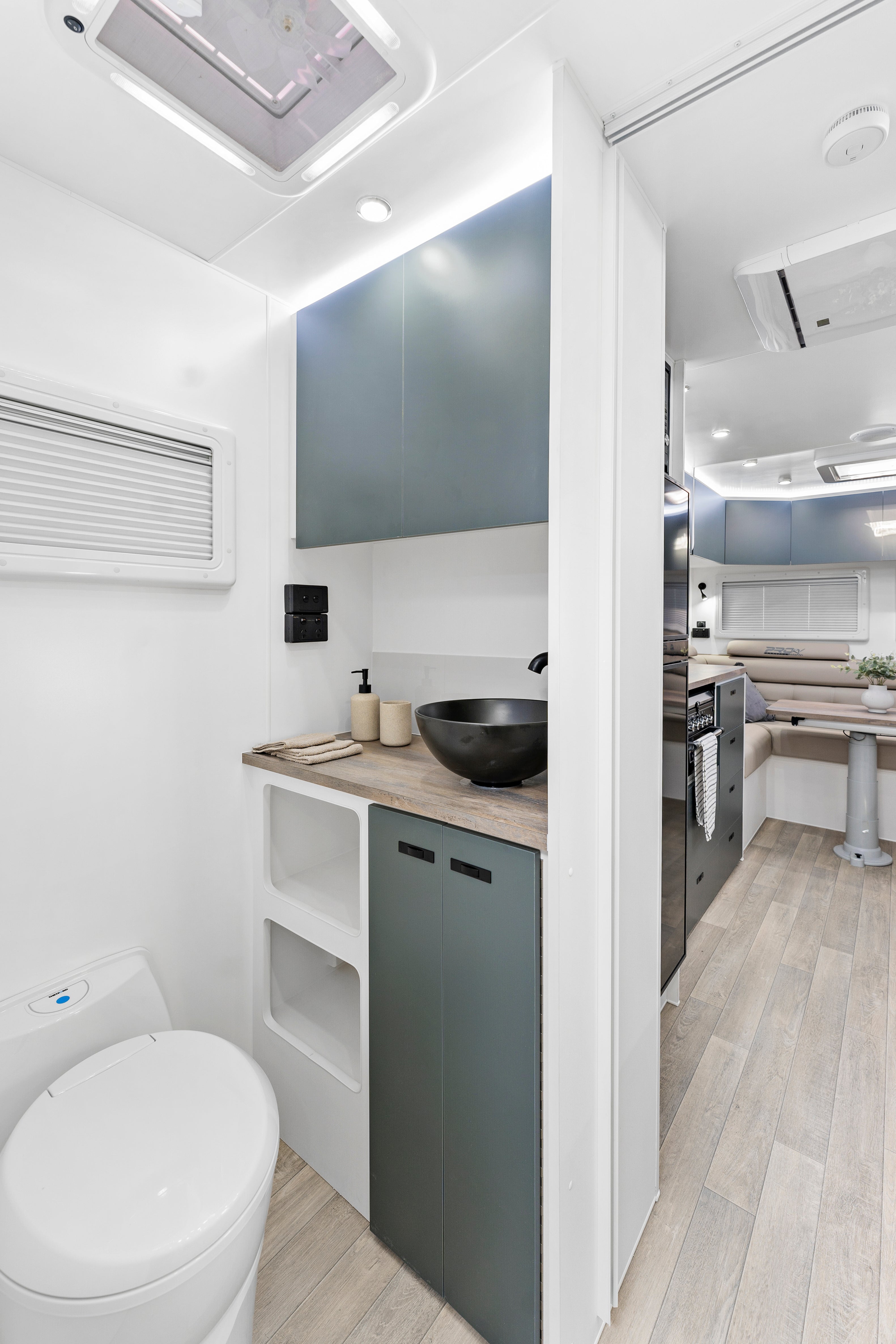 ProRV Panther Aluminium Frame Cravan Interior Toilet Angled to Include Kitchen.