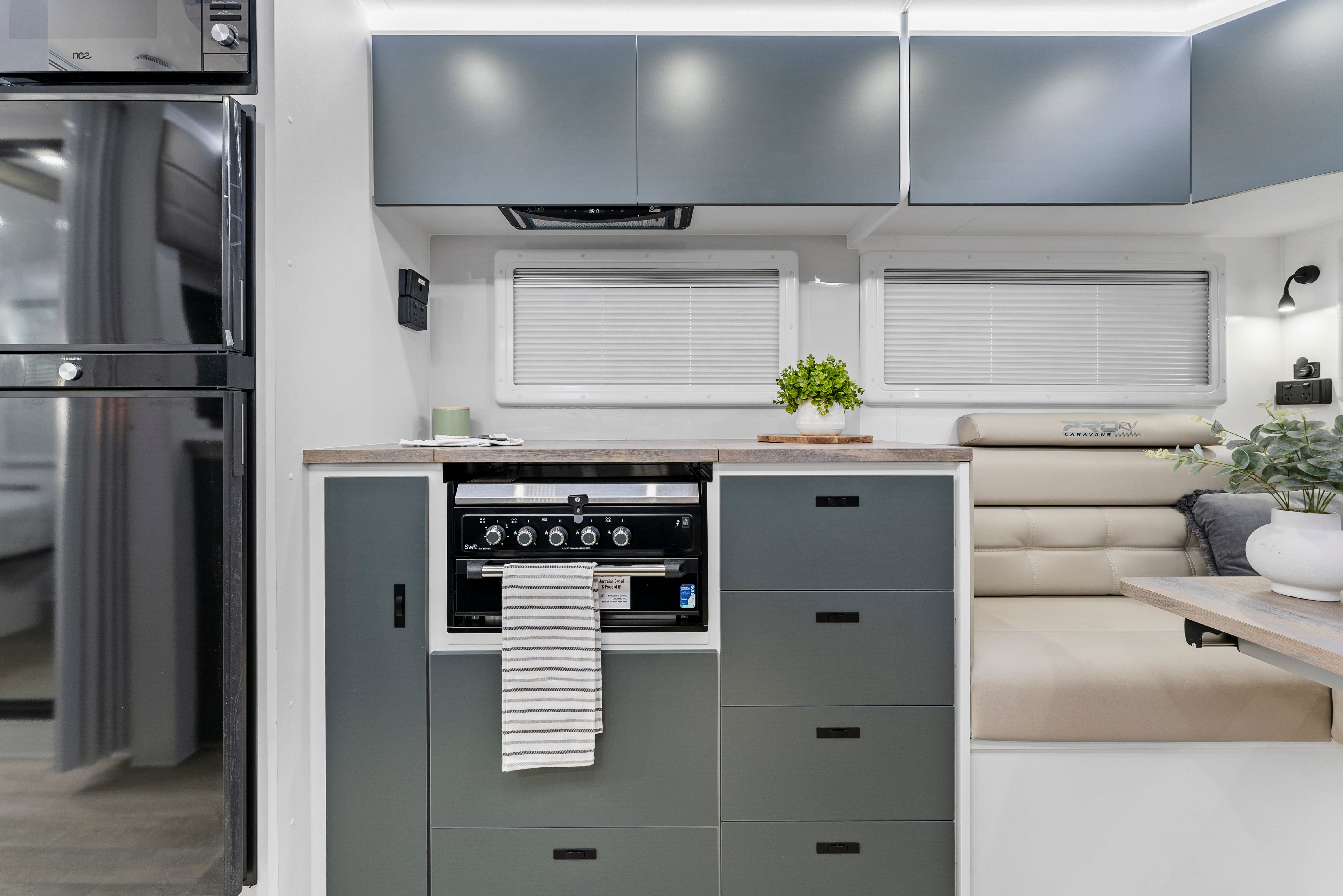 ProRV Panther Aluminium Frame Caravan Interior Kitchen Including Covered Cooktop, Cupboards, Drawers, Oven and Fridge.