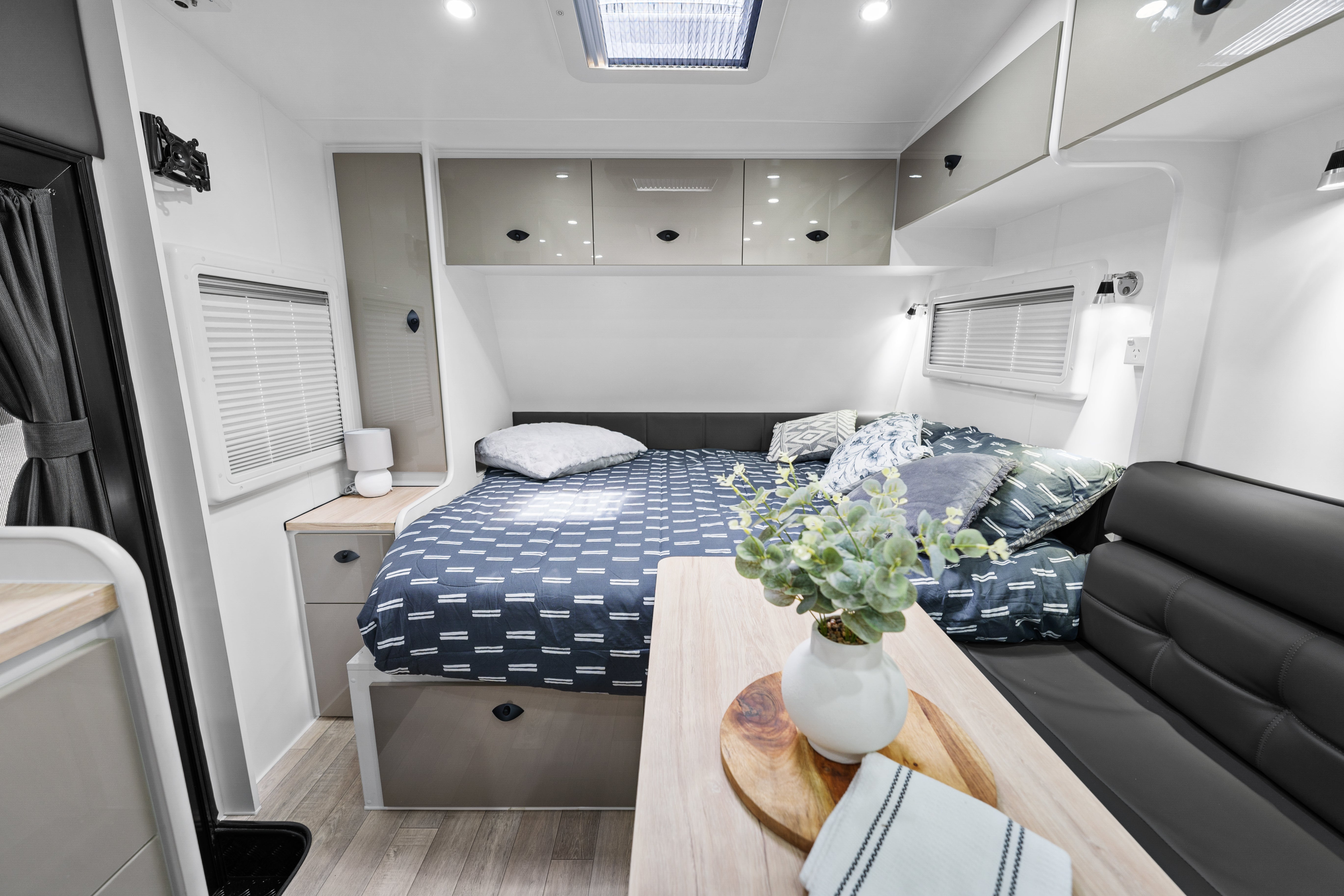 ProRV Caravans caravan bed and living area.