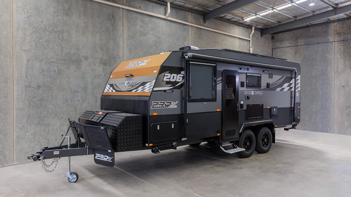 ProRV Kookaburra aluminium frame caravan parked in brightly lit warehouse.