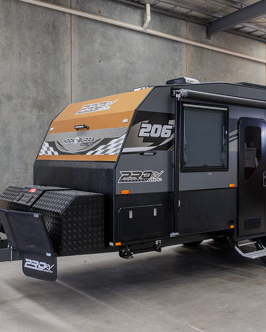 ProRV Kookaburra aluminium frame caravan parked in brightly lit warehouse.